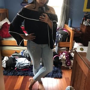 Off the shoulder white and black top.
